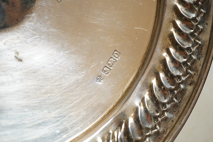 A pair fo George V silver vases, Birmingham,1913, James Woods & Sons, on weighted bases, together with a tazza on weighted base, Birmingham, 1938, William Hutton & Sons and a pair of bonbon dishes, Sheffield, 1910, Walke